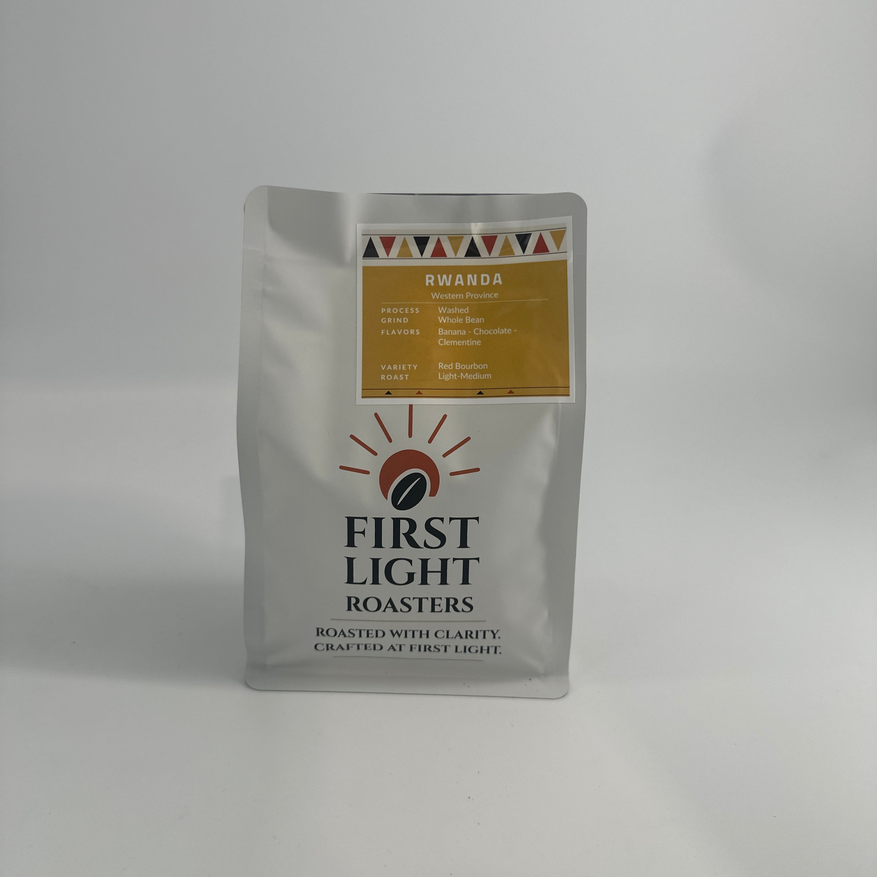 Coffee package labeled 'First Light' on a white background