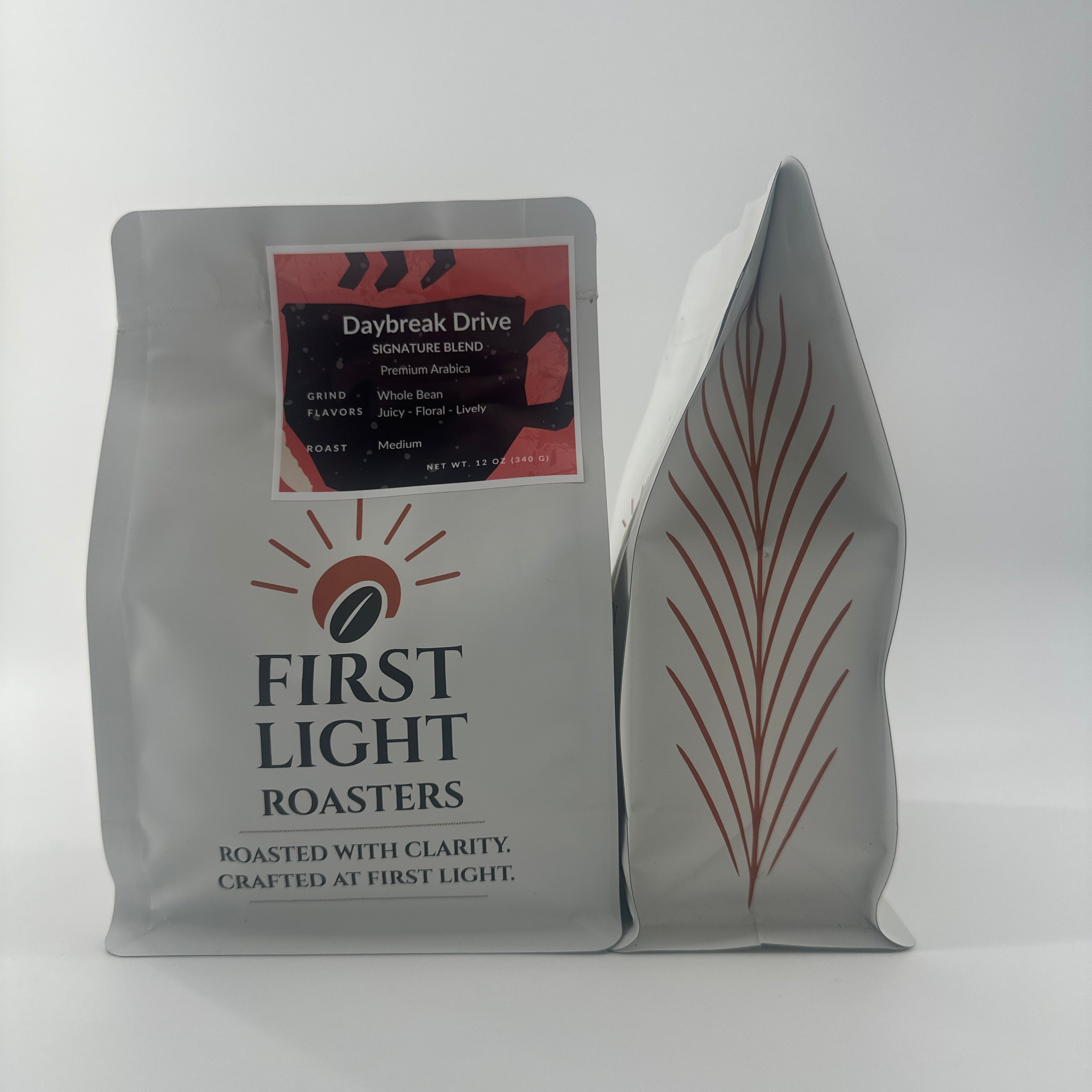 Coffee package labeled 'First Light' on a white background