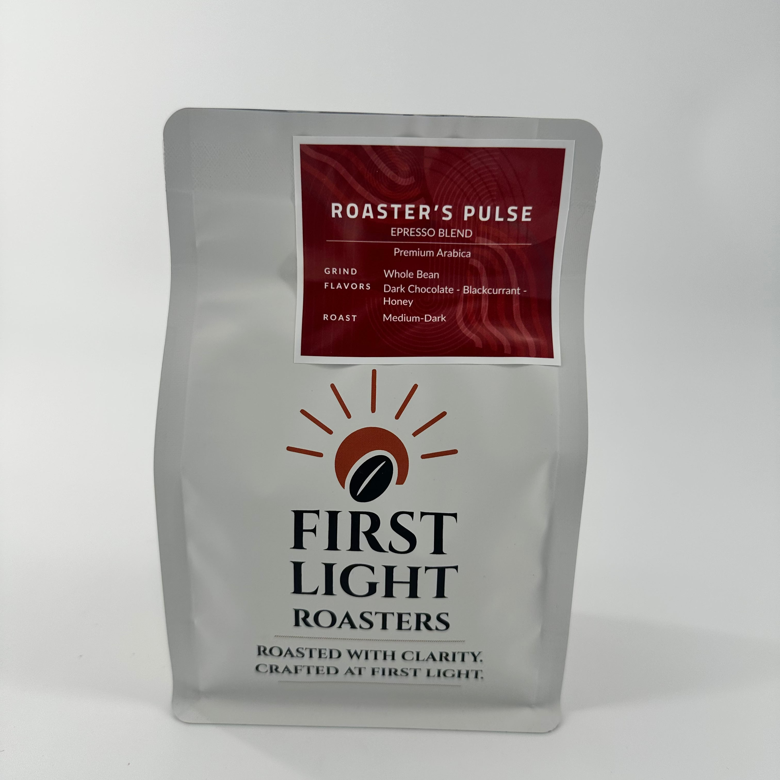 Coffee bag from First Light Roasters on a white background